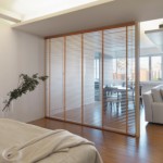 Partition separating bedroom from living room